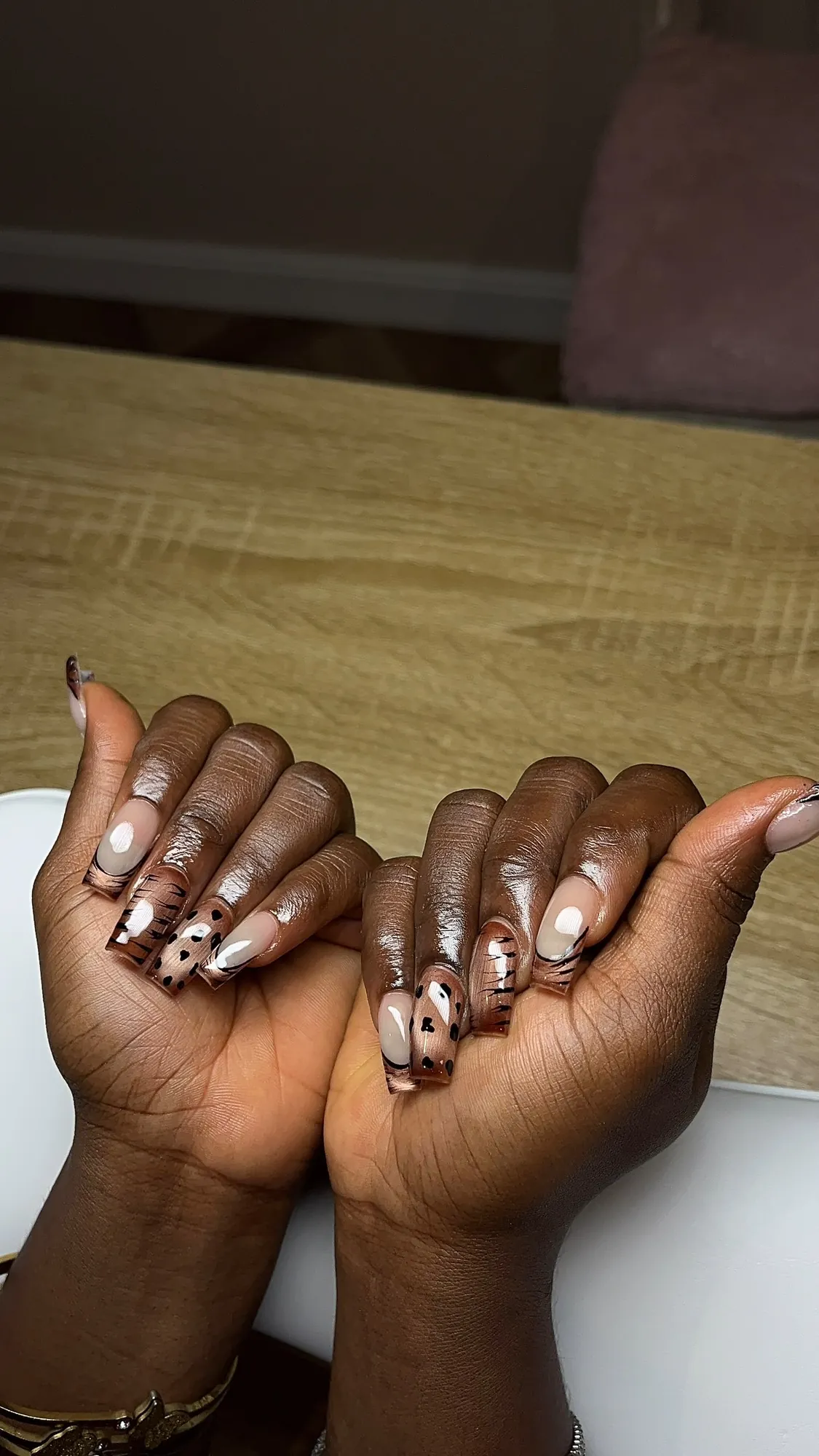 Brown heart nail art