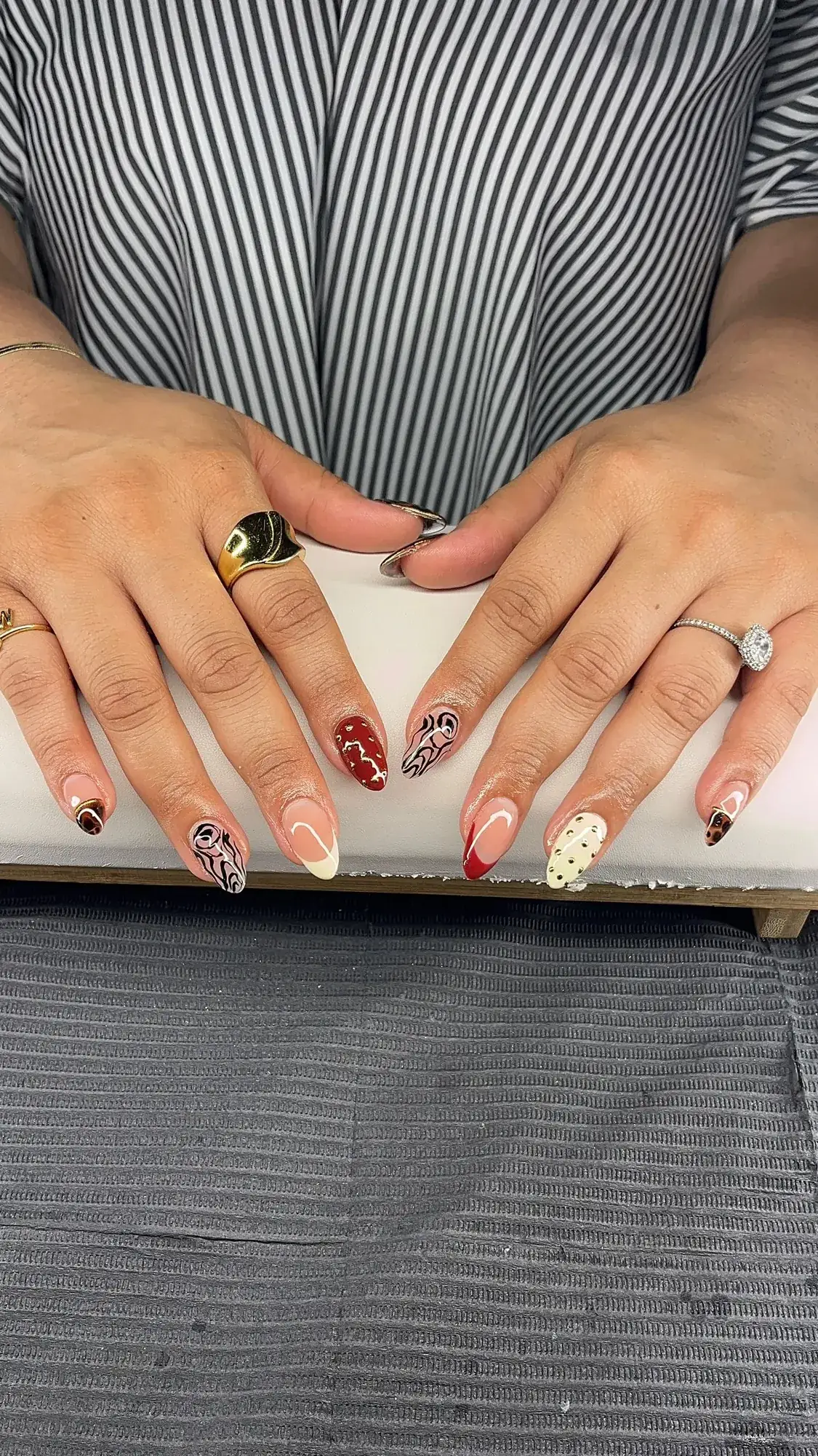 Mixed nail art with charms