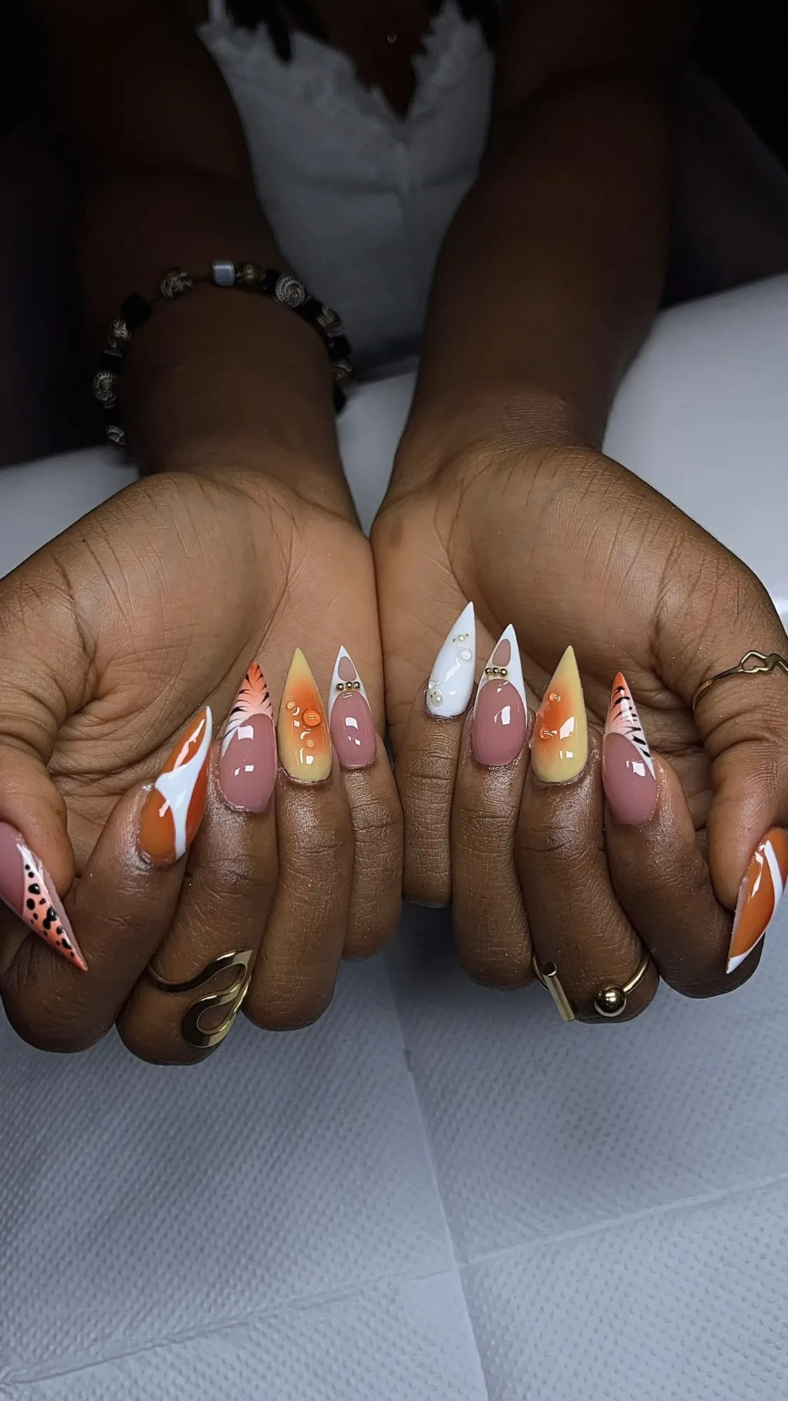 Stiletto set with orange abstract art