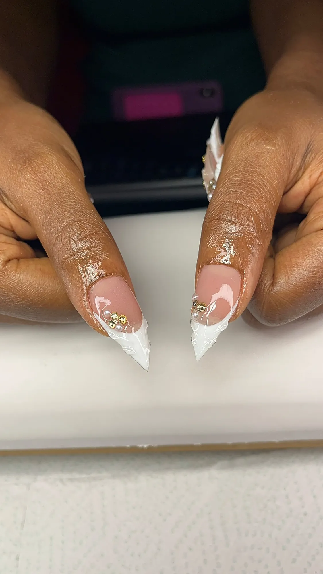 White-tip stilettos with gold detail
